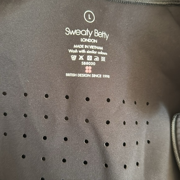 SWEATY BETTY Black Power Hybrid Workout Athleisure Jacket. Zipper front. Large. - Picture 8 of 10